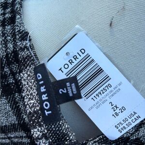 Torrid Black and White Knit Dress
Brand new with tag